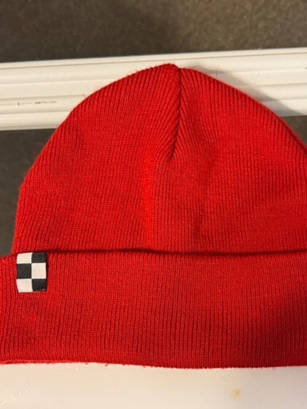 Red Knit Beanie with Black and White Checker Accent